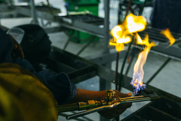 fire being ignited by a welder